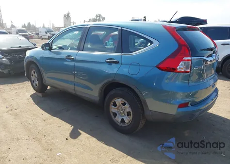 2015 Honda Cr-V Lx z USA, uszkodzony, nr VIN 2HKRM3H35FH556344